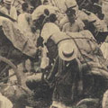 Photograph: Crowd of refugees streaming into the open ground in front of the Nijūbashi (main entrance to the Imperial Palace).