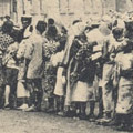 Postcard: Disaster victims lining up for a handout of food in Ueno Park, Tokyo