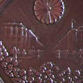 Medals: Imperial Capital Reconstruction medals issued by the City of Tokyo. The medal for male recipients is on the left while the one given to females is on the right.